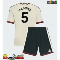 Camisa de Futebol Manchester United Harry Maguire #5 Equipamento Alternativo Infantil 2026-27 Manga Curta (+ Calças curtas)